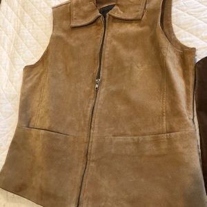 Two leather vests one fitted and lined